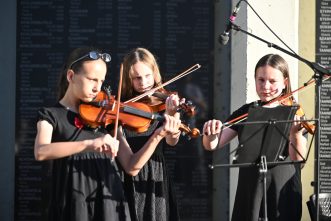 The Blue Art School Children's Choir and student musicians performed the Hebrew song Ani Ve'Ata ("You and I Will Change the World")