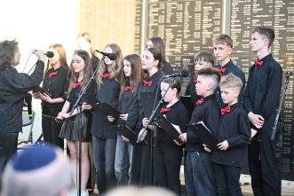 The Blue Art School Children's Choir and student musicians performed the Hebrew song Ani Ve'Ata ("You and I Will Change the World")